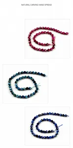 Detail view of 8mm faceted star tiger eye beads in rose, lake blue, and navy tones