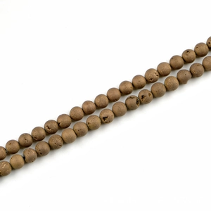 Close-up of 8mm matte natural stone beads with detailed brown mineral texture for DIY jewelry