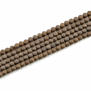 Close-up of 8mm dark brown natural stone beads with matte texture and druzy details