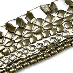 Various geometric pyrite natural stone beads for DIY jewelry making in metallic bronze