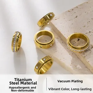 Macro shot of titanium steel spinning rings with vacuum plating and star designs