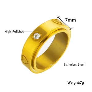 Detailed view of 7mm high polished stainless steel heart ring with cubic zirconia