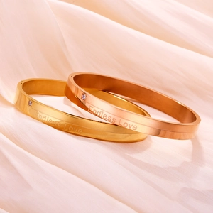 Bracciali Endless Love in oro e oro rosa con piccoli zirconi incastonati
