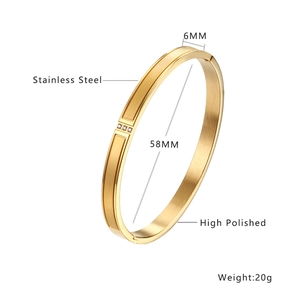 Polished 18K gold-plated stainless steel oval bangle with zircon stones, 58mm inner diameter