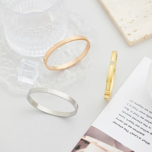 Three-color titanium steel buckle bracelets with crystal accents in gold and silver finish