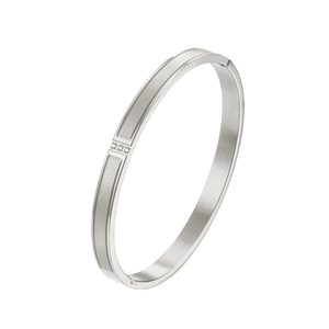 Detail view of silver stainless steel bangle with three embedded cubic zirconia stones