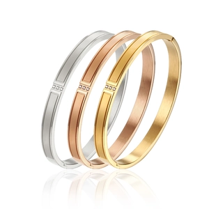 Three-color set of titanium steel cuff bracelets with triple diamond inlay and gold plating