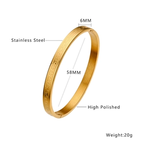 Polished stainless steel gold bracelet featuring an elegant engraved Greek key pattern