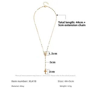 Size guide for gold alloy cross and oval pendant necklace with 44+5cm chain dimensions