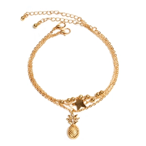 Elegant multi-layer gold anklet featuring a crystal pineapple and polished star pendant