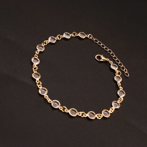 Elegante tobillera de cadena dorada con cristales transparentes de doble cara y cierre ajustable