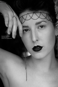 Detailed view of Gothic punk metal chain headband and matching finger bracelet set