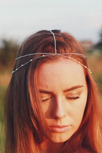 Detail of silver bohemian head chain with delicate copper bead multi-layer strands