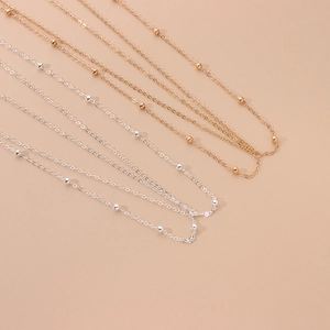 Minimalist copper bead chain hairband in gold and silver finish with elegant bead accents