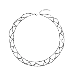 Detailed close-up of multilayer punk metal chain fringe headpiece in gunmetal finish
