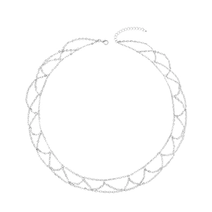 Detailed view of silver layered body chain featuring intricate diamond mesh design