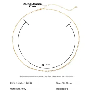 Detail view of golden rhinestone chain body jewelry with 80+20cm size specifications