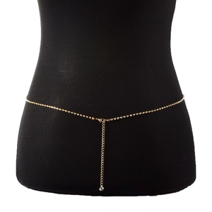 Punk style golden waist chain with rhinestones on a black mannequin, adjustable jewelry piece