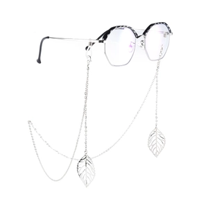 Elegant eyewear chain with silver leaf pendants on stylish polygonal metal frame glasses