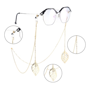 Golden eyewear chain with hollow leaf pendants and adjustable rubber loops for women