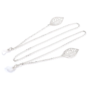 Detailed view of silver leaf pendants on stylish metal glasses chain and mask strap