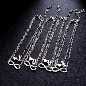 Set di cavigliere argentate a strati con cuore infinito e lettere LOVE regolabili