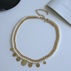 Multi-layer gold chain body jewelry with faux pearls and vintage embossed coin pendants