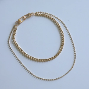 Minimalist double-layered gold body chain with cuban link, rhinestones, and carabiner clasp