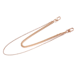 Detail of rose gold double-layer body chain with rhinestones and metal lobster clasps