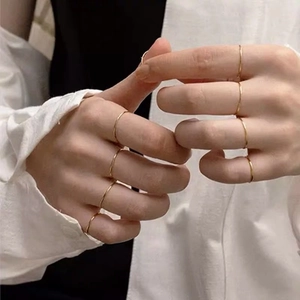 Minimalist stackable gold thin rings for women in polished stainless steel for daily wear