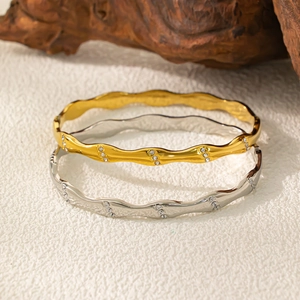 Vintage bamboo style gold and silver stainless steel bangles with zircon accents