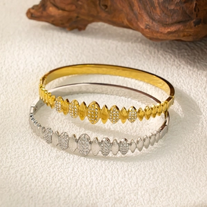 Bracelet goutte en acier inoxydable avec cristaux en finitions or et argent