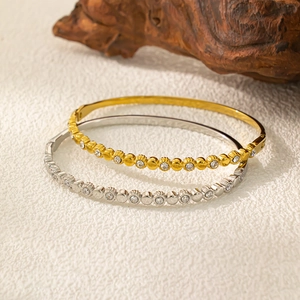 Bracelets luxueux en acier inoxydable et zircon dorés et argentés au design circulaire