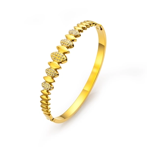 Bracelet ovale en acier inoxydable plaqué or 18 carats avec motif de feuilles