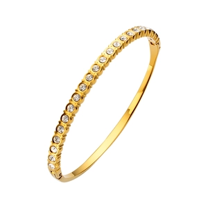Detalle de la pulsera de titanio dorado con incrustaciones de circonita y cierre oculto