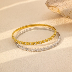 Bracciali in acciaio al titanio placcati oro 18k e argento con zirconi e fiori