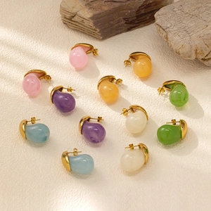 Detailed view of 18k gold plated stainless steel teardrop stud earrings in multiple colors