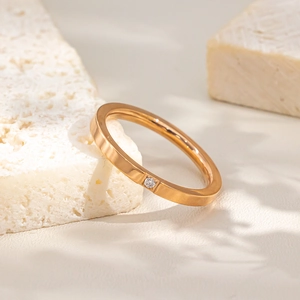 Minimalist 18k gold plated stainless steel ring with a single small zircon stone