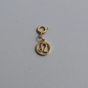 Detail of gold Leo constellation charm pendant with a spring clasp for DIY jewelry