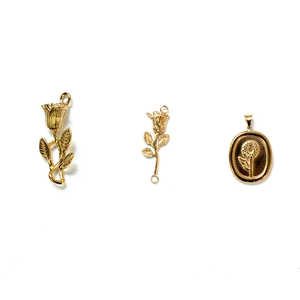 18K gold plated rose and sunflower jewelry pendants set in a minimalist layout