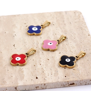 Charming four-leaf clover evil eye pendants in red, blue, pink and black on stone