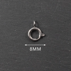Detailed close-up of 8mm silver stainless steel spring ring clasp for jewelry making