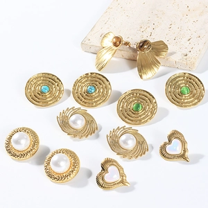 Vintage gold geometric earrings set with pearls and natural stones in French retro style