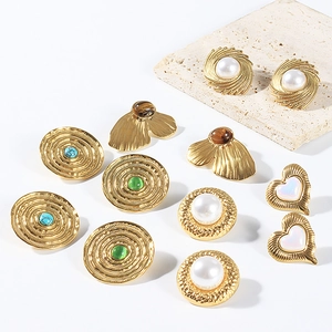 Retro geometric gold earrings with pearls and natural stones in a vintage luxury set