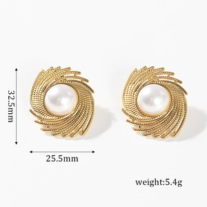 Detail view of gold spiral earrings with white pearl inlay and exact dimensions