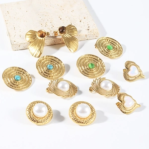 Retro geometric gold earrings with pearls and natural stones in a high-end vintage style