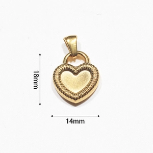 Detailed macro view showing the 18mm by 14mm heart pendant dimensions and golden texture