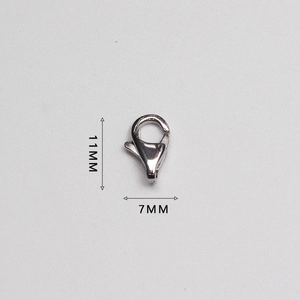 Macro detail of 316L stainless steel lobster clasp showing 11mm by 7mm dimensions