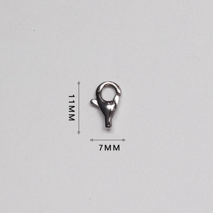 Macro detail of a 11mm by 7mm polished stainless steel lobster clasp for jewelry making