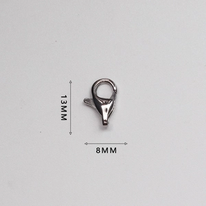 Macro shot of polished stainless steel lobster clasp with 13mm height and 8mm width